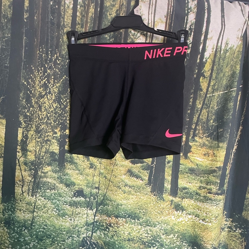 Nike Women's Athletic Shorts in Black with Pink Logo